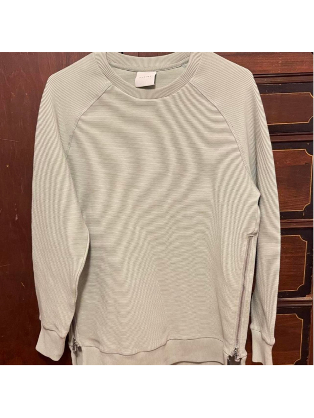 Beautiful Varley Manning sweatshirt in a gorgeous, soft sage/celery green hue